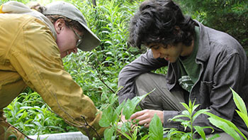 Mentor Audrey Barker Plotkin and Aaron in the field