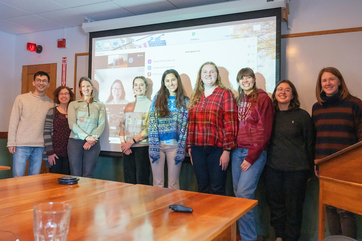 This photograph shows the 5 interns (including 1 virtual) and their mentors, plus coordinator Ben Goulet-Scott.