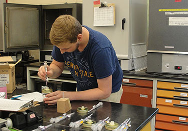 [States Labrum taking incubation respiration samples. Photo by Jill Fusco]