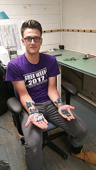 [Val holding five Sap Flow Sensors. Photo by Jolene Saldivar]