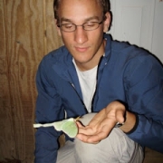 [Adam holds a Luna Moth.]